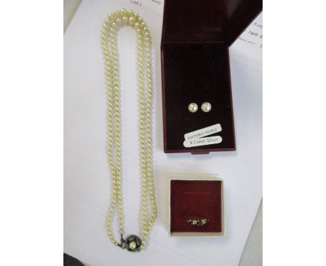 An 18ct gold ring set with two diamonds and three sapphires, 2.4g together with a pair of 9ct gold and pearl earrings and a t