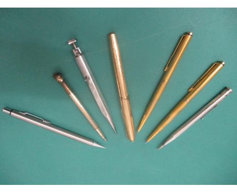 A selection of vintage pens comprising a sterling silver Swan fountain pen Mabie Todd & Co, a silver cased pencil holder, two