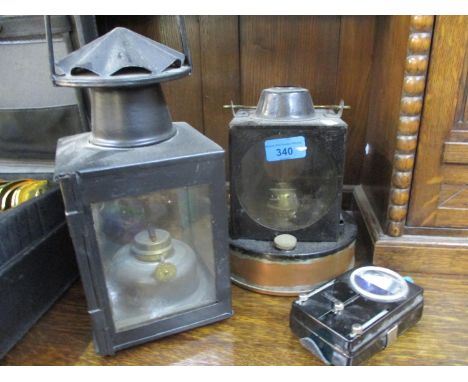 A vintage British Railways oil lamp made by Sherwood of Birmingham together with another British Railways oil lamp and a Narv