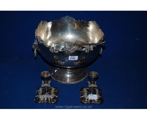 A vintage silver plated Punch Bowl and ladle together with a pair of Candlesticks.