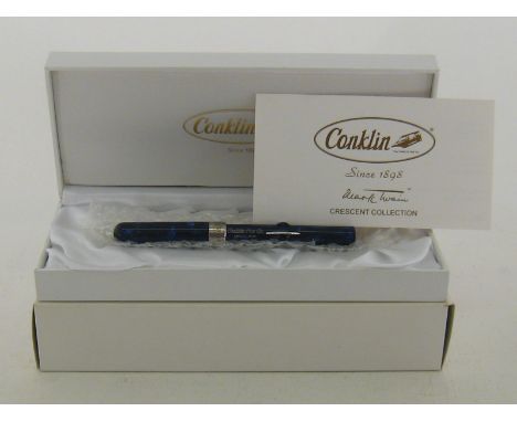 Conklin. A Conklin Mark Twain crescent edition fountain pen. Replica of the original Conklin crescent filler used and promote