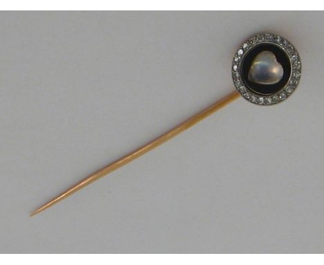 CARTIER, an Art Deco diamond, enamel and moonstone stick pin, circa 1920, the circular head with a heart shaped moonstone to 