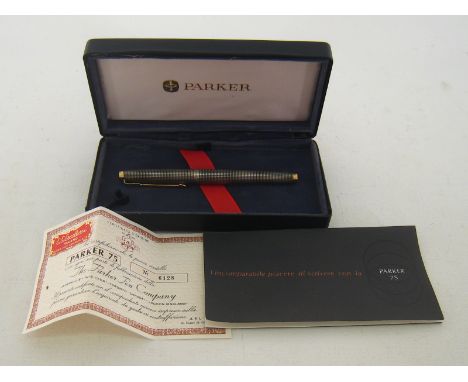 PARKER 75, a sterling silver cisele pattern fountain pen, no.6128, with 14k fine nib and cartridge filler, together with box 