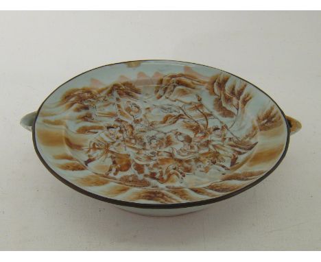 An early 20th. century Chinese ceramic heated feeding plate with sepia flambe scene of warriors on horseback. 25cm. diameter.