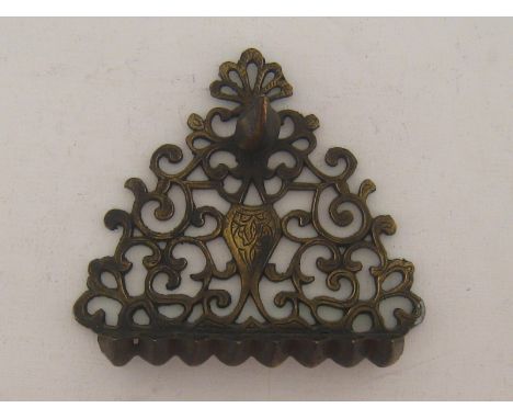 Judaica. A gilt brass wall mounted Hannukah lamp, 19x 17cm. high.