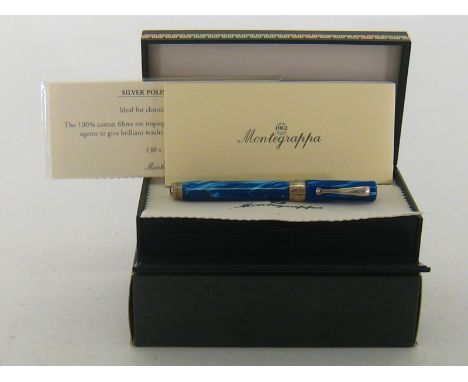 Montegrappa. A Montegrappa Symphony Fountain pen. Turquoise celluloid & sterling silver trim. 18K Oblique medium nib. Cartrid