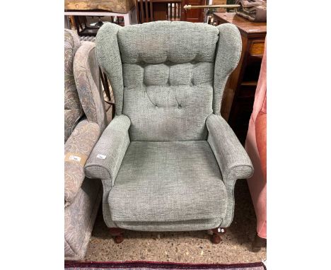 Button back wing armchair