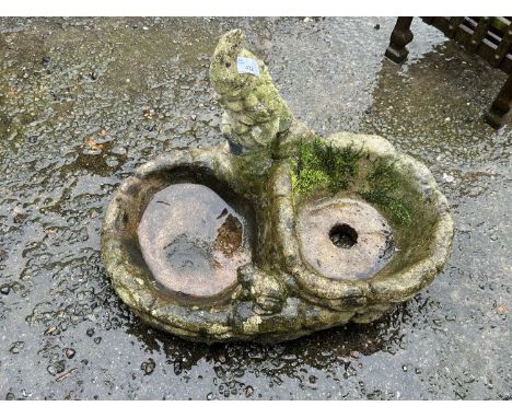 Combination planter and bird bath with gnome decoration