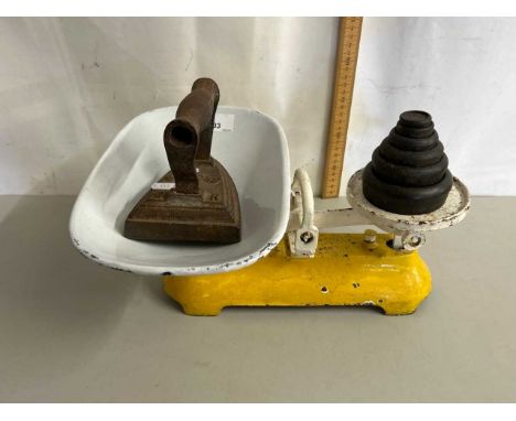 Vintage kitchen scales with weights together with a flat iron