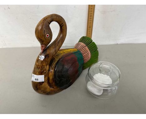 An Indian wooden model of a swan together with a glass dressing table jar