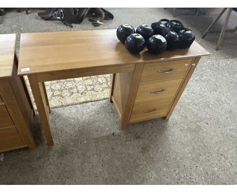 Modern light wood single pedestal desk with three drawers and metal handles, 120cm wide