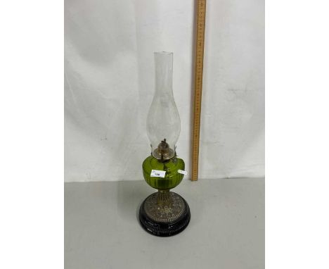 Late 19th or early 20th Century oil lamp with green glass font