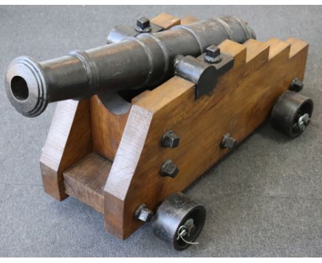 Attractive and Decorative Copy of a 19th Century Ships Cannon, multi-stage iron barrel with turned reinforces, swollen muzzle