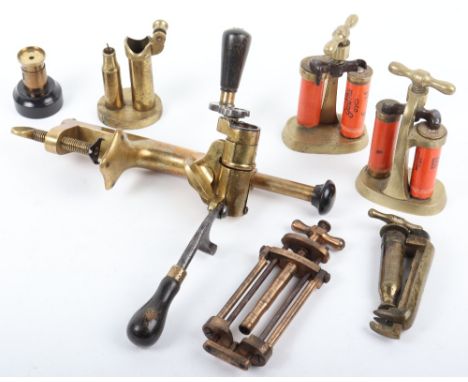 Assorted 12-bore Brass Cartridge Reloading Tools, comprising a table mounted multi-tool by G&amp;JW Hawksley for roll-crimpin