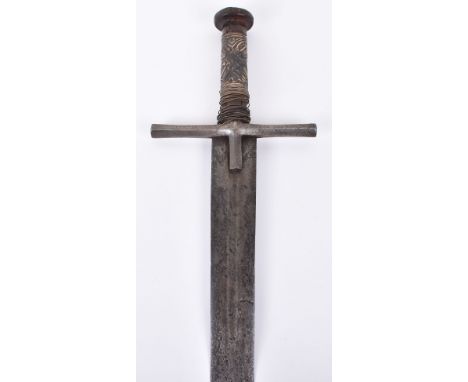 Sudanese Broad Sword Kaskara, Late 19th Century, straight double edge blade, iron cross piece, grip partly covered with embos