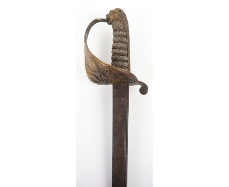 Victorian Naval Officers Sword, pipe back blade with traces of etched decoration, regulation brass hilt with folding side-gua