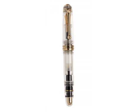 AURORA "88 DEMO" FOUNTAIN PEN.Barrel in crystalline resin and gold.Limited edition. Exemplary 1593.Nib 18Kts yellow gold. 18K