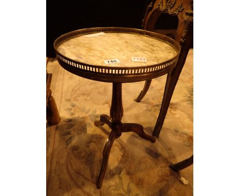 Walnut tripod wine table with a galleried marble top and ormulu mounts 