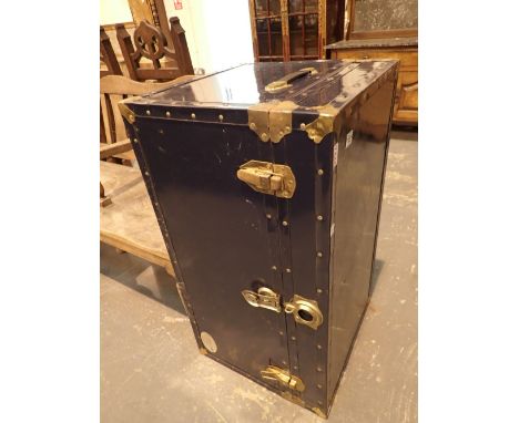 Large black painted luggage trunk