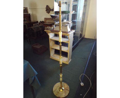 An Onyx and Brass Standard Lamp. 