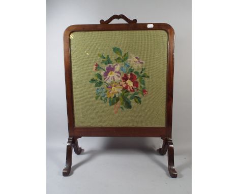 An Edwardian Mahogany Framed Tapestry Fire Screen.