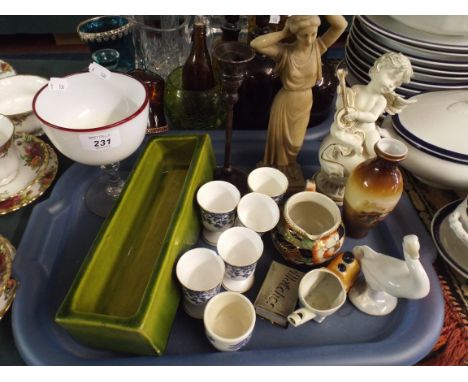 A Tray of Mixed Ceramics to Include Royal Worcester Bluer and White Egg Cups, A Child's Whistle Egg Cup Figures Etc. 