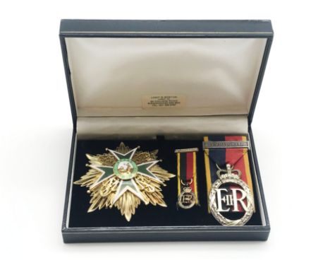 A GILT METAL AND ENAMEL BADGE, INSCRIBED ATAVIS-ET-ARMIS, MILITARY AND HOSPITALLER ORDER OF ST. LAZARUS OF JERUSALEM TOGETHER