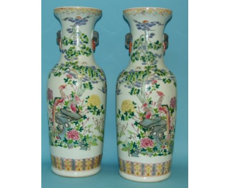 A pair of Chinese vases, decorated birds and foliage in enamel colours, 52 cm high (2) Condition report Report by NG

Pair of