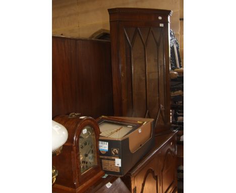 An Edwardian oak mantel clock, a brass lamp, a corner cupboard, and various pictures (qty)