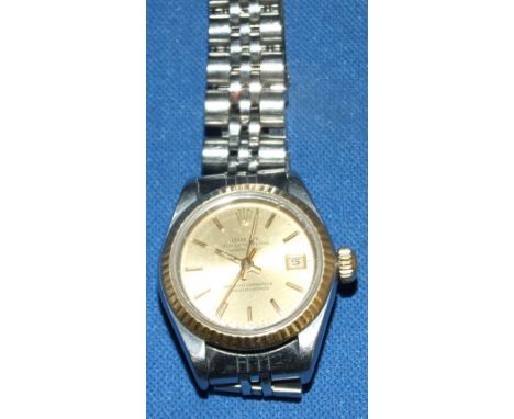 A lady's stainless steel Rolex Oyster Perpetual Datejust wristwatch, with baton indices, replacement Rolex bracelet, box and 