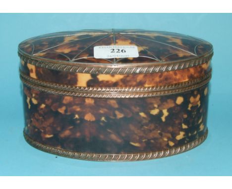 A faux tortoiseshell oval tea caddy, 9.5 cm high 