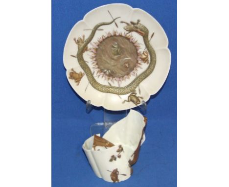A Worcester porcelain cup and saucer, moulded frogs, snake and foliage, with painted and gilt decoration (cup a.f.)