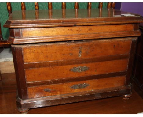 A 19th century French box, in the form of a commode chest of drawers, on bun feet, 55 cm wide