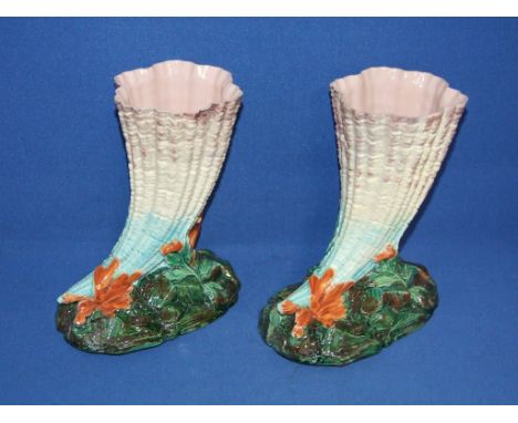 A pair of Worcester cornucopia vases (restored), 15.5 cm high