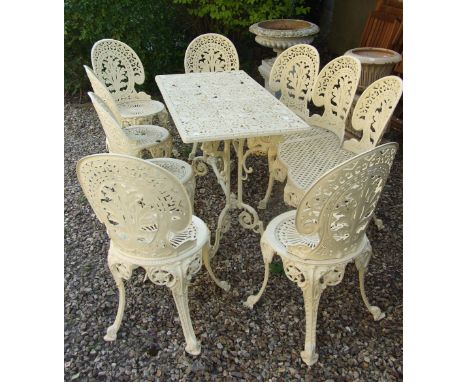 A set of six cream painted garden chairs, a matching triple chair back garden bench, and a table (8) Condition report Report 