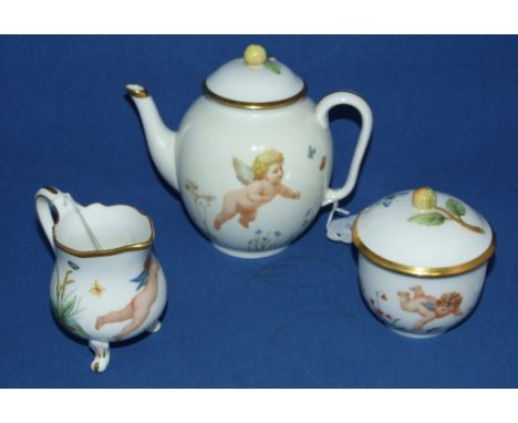 A Worcester porcelain three piece doll's tea service, decorated cherubs, butterflies, flowers and foliage (the teapot restore