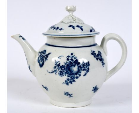 An 18th century Worcester porcelain teapot and cover, decorated fruit in underglaze blue, 17 cm high (some chips)  See illust