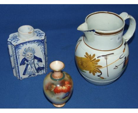 A Royal Worcester porcelain vase, decorated berries and leaves, 302, 10 cm high, a Delft tea caddy, and a creamware harvest j
