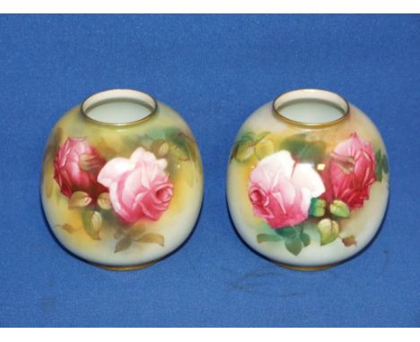 A pair of Royal Worcester porcelain vases, decorated roses, ***only one signed M Hunt (not both)****, 2491, 7.5 cm high (2)