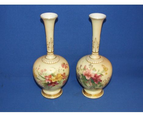 A pair of Royal Worcester porcelain vases, decorated flowers, 1661, 23 cm high (2)