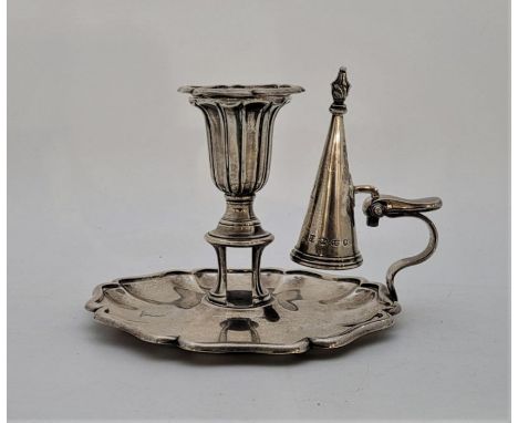 An early Victorian silver chamberstick and snuffer, by Henry Wilkinson & Co, Sheffield 1839, with raised octofoil border, hei