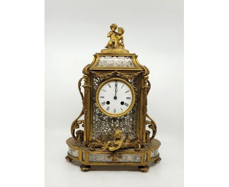 An early 20th century English Chas. Frodsham & Co. ormolu table clock, bell strike, movement engraved "Chas. Frodsham & Co. M