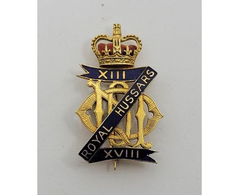 MILITARY INTEREST:&nbsp;A 9ct. gold and cloisonne enamel 13th 18th Royal Hussars brooch, by Garrard &amp; Co Ld, Birmingham 1