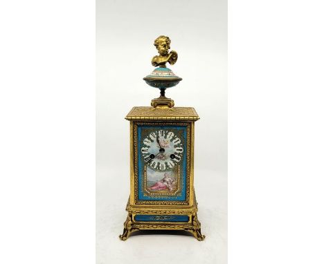 A late 19th century French ormolu and porcelain table clock, bell strike, movement stamped "Fenon, Paris", having painted por