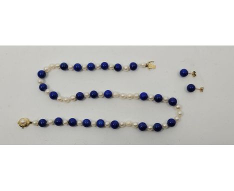 A cultured pearl and lapis lazuli bead necklace&nbsp;with precious yellow metal lapis lazuli stud earrings en suite,&nbsp;the