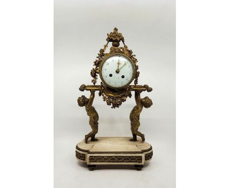A 19th century French ormolu and white marble mantel clock, bell strike, having signed domed white enamel Arabic numeral dial