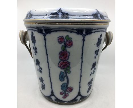 A Victorian twin handled porcelain commode having removable pan to top, height 29cm x diameter 29cm.