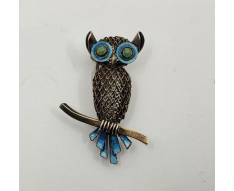 A silver and blue enamel "Owl" brooch, possibly Danish, stamped "S925", having wire work body and cloissone enamel tail feath