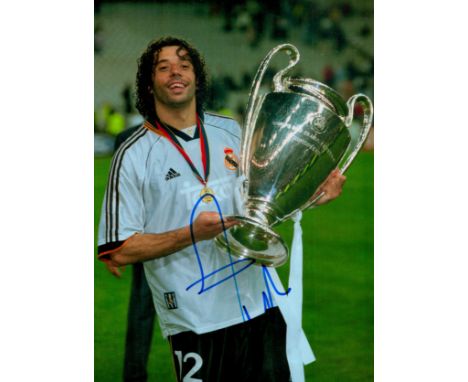 Evan Campo signed 12x8 inch colour photo pictured celebrating with the Champions league trophy during his playing days with R