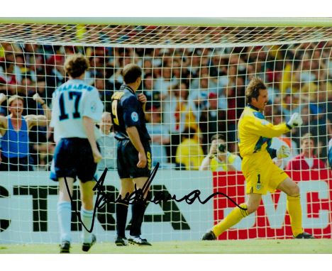 David Seaman signed 12x8 inch colour photo pictured while playing for England against Scotland during Euro 96. Good condition